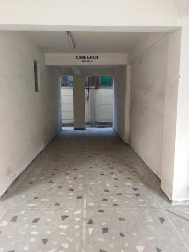 an empty garage with a sign that reads angel hospital at Nalanda Tulip in Kolkata
