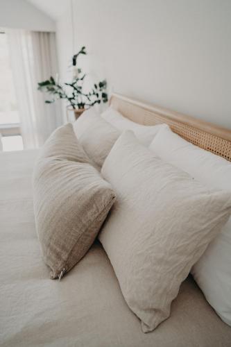 a group of pillows sitting on a bed at View Street Studios - Tallerack in Albany