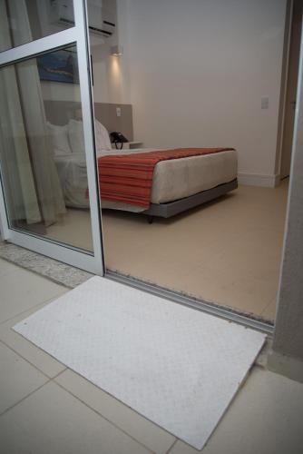 Katil atau katil-katil dalam bilik di Ramada by Wyndham Macae Hotel & Suites