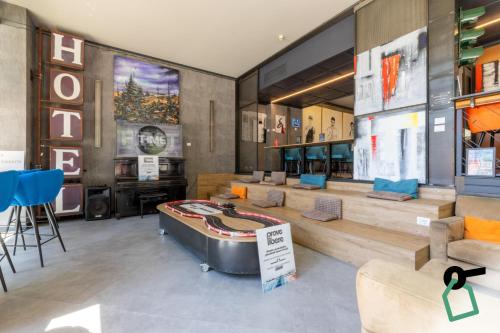 a large room with a large tub in the middle of it at Hotiday Milano CityLife in Milan