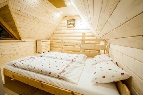Postel nebo postele na pokoji v ubytování Osada Stary Bór