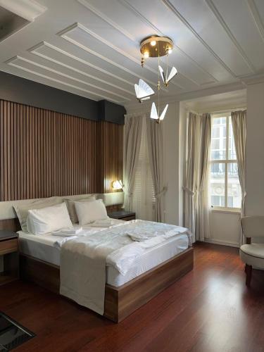 a bedroom with a large bed in a room at Şah Bey Konağı in Istanbul
