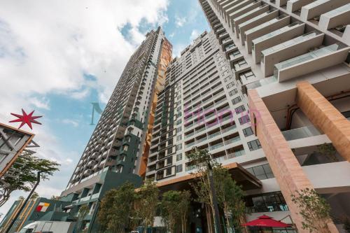 a group of tall buildings in a city at Antharas 1 Premier Suites Genting Highlands in Genting Highlands