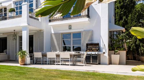 VACATION MARBELLA I Villa White Orchid, Palatial Villa, Private Heated Pool, Prime Golf Valley Location, Minutes from Puerto Banus, Luxury Interiors, Outdoor Fire Pit Lounge