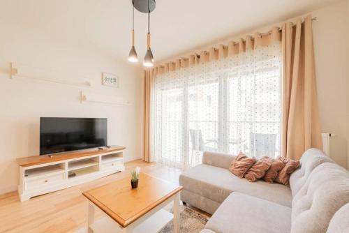 Cozy Apartment Near the Beach with Parking and Balcony in Pogorzelica by Noclegi Renters