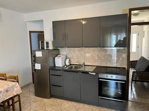 Apartmani Lacic Est