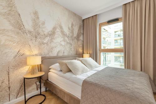 Stylowy Apartament z Balkonem Parkingiem oraz Dostępem do Siłowni by Noclegi Renters