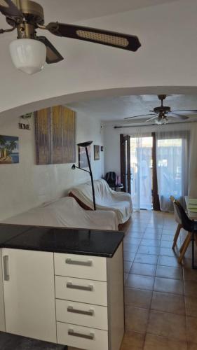 a bedroom with a bed and a dresser in it at villaislandia in Oropesa del Mar