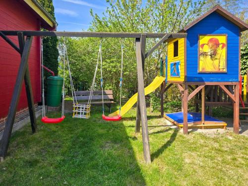 a playground with two swings and a swing at Zinnowitz, Haus Jörn in Zinnowitz