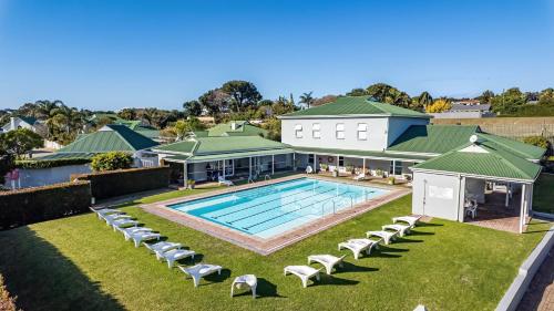 an aerial view of a house with a swimming pool at Riverclub Villas in Plettenberg Bay