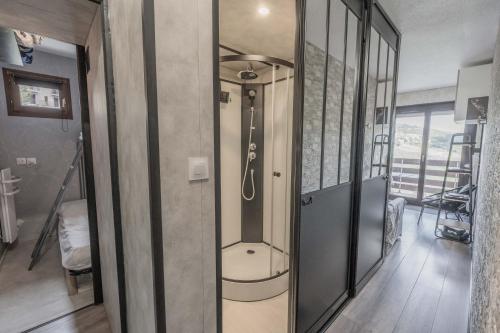 a bathroom with a shower in a room at L'Elan in Les Angles