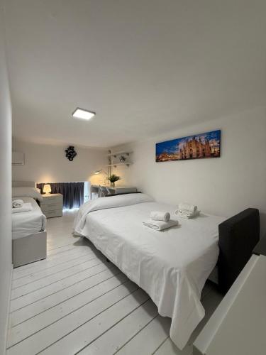comfort loft Milano 3BR 3BA and fast Wi-Fi 15 minutes to Duomo