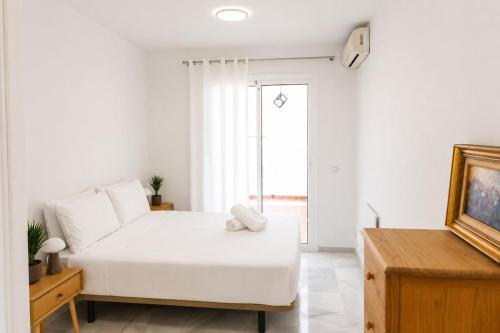 Bright Coastal Apartment with Pool and Parking
