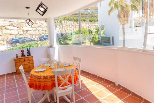Bright Coastal Apartment with Pool and Parking