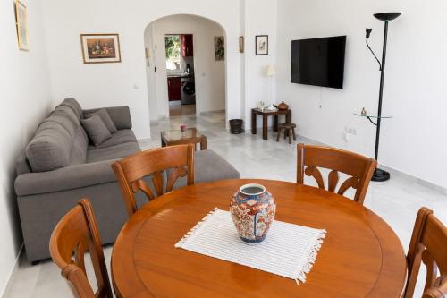 Bright Coastal Apartment with Pool and Parking