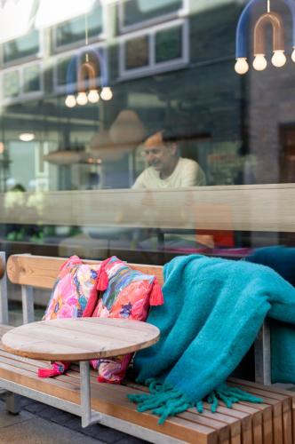 a table with a blue blanket on top of it at Comfort Hotel City in Gothenburg