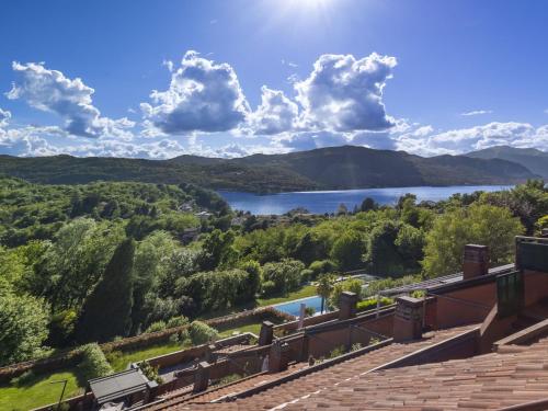a view of a lake from a house at Apartment Lake & Pool by Interhome in Leggiuno