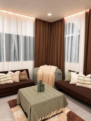 a living room with two couches and a couch at DOS Unica Hija Hometel by TahZora in Valencia