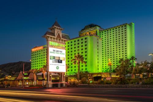 a large building with a green light on it at Tropicana Laughlin in Laughlin