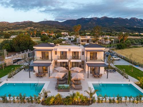 an aerial view of a house with a pool at Mama Rosa Luxury Villas with private pools in Zipárion