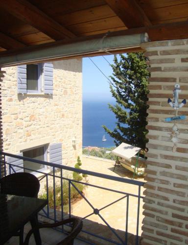 a view of the ocean from the balcony of a house at Villa koukla horizon in Agios Nikolaos