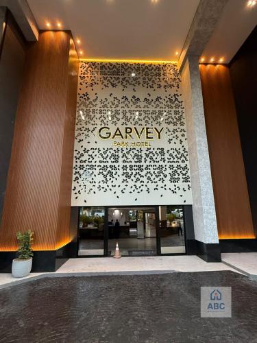 a lobby of a building with a sign on it at ABC Apart Hotel in Brasília