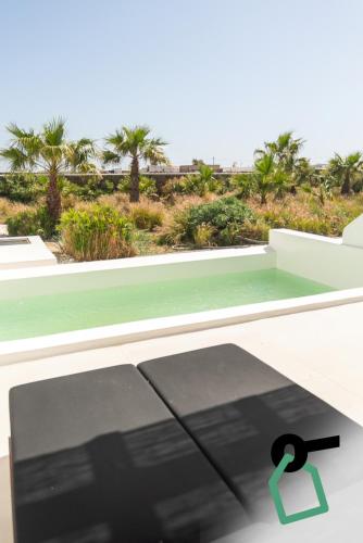a view of the ocean from the roof of a house at Hotiday Suites Mykonos in Mikonos
