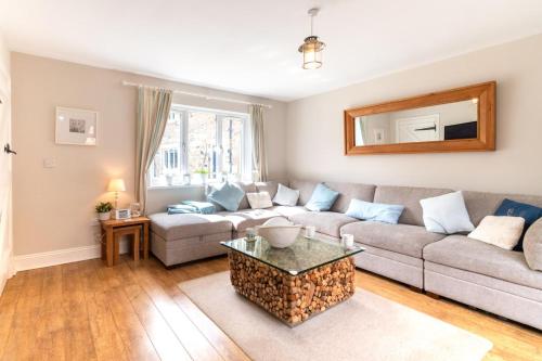 a living room with a couch and a table at 3 Bed in Beadnell oc-44965 in Beadnell