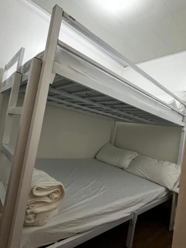 a bunk bed in a room with a bunk bedutenewayewayangering at Travellers Staycation in San Jose del Monte
