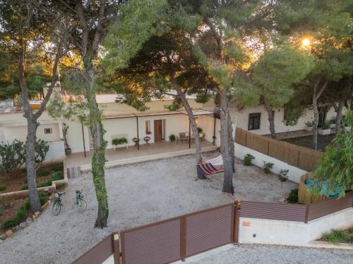 an aerial view of a house with trees and a flag at Villa Fefè in Nardò