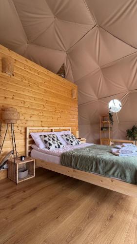 a bedroom with a bed in a tent at Chata Jaga in Szklarska Poręba