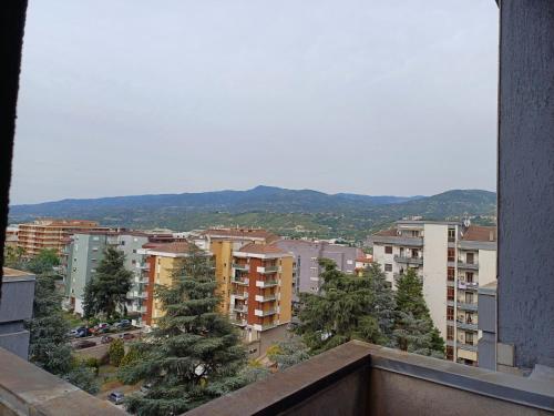 a view of a city with buildings and trees at Confort home L da Vinci in Quattromiglio