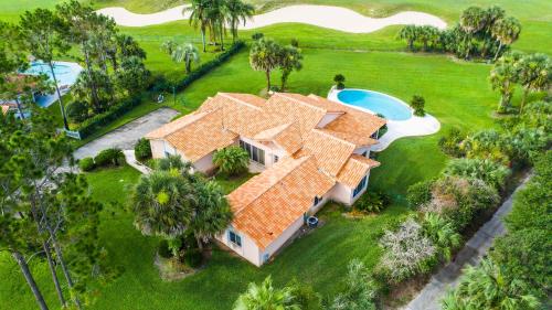 an overhead view of a house with an orange roof at SWISS 30 - Golf Course in Clermont
