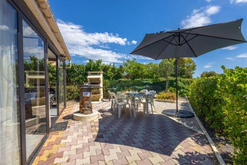 Foto Petit pavillon pour 8 personnes dans une résidence avec piscine 2