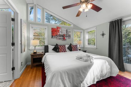 a bedroom with a bed and a ceiling fan at 826 Wilson Road in Highlands