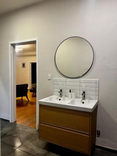 a bathroom with a sink and a mirror on the wall at Rio amazonas 7 in Mexico City