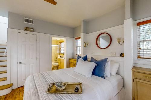 a bedroom with a bed with a tray on it at Fish, Hike & Unwind! Quiet Haven in Steinhatchee in Steinhatchee