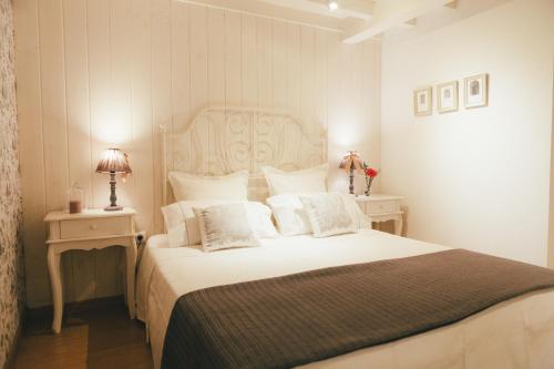 Llit o llits en una habitació de Apartamentos Aurelia Antica
