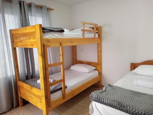 a bunk bed room with two bunk beds at Nirvana Home Calima Darien in Darién