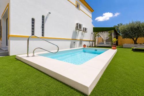 Foto Casa Andaluza con piscina y jardín privado en Gelves a 15 minutos del centro de Sevilla 4