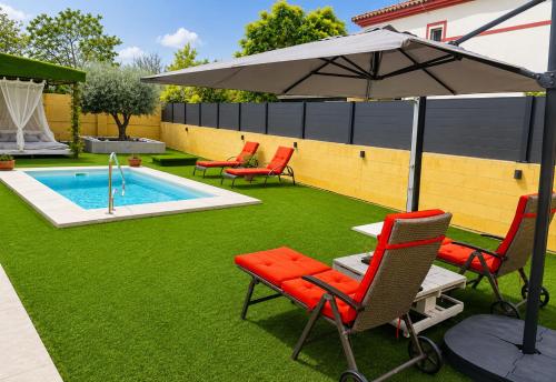 Foto Casa Andaluza con piscina y jardín privado en Gelves a 15 minutos del centro de Sevilla 1
