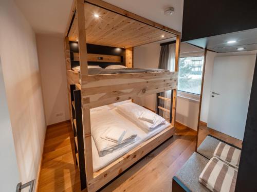 a couple of bunk beds in a room at Mariazeller Zirbennest in Mariazell