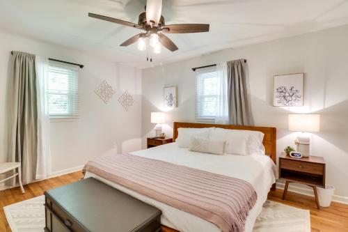 a bedroom with a bed and a ceiling fan at Meme & Papas Compound 2 Homes, Hot Tub in Afton