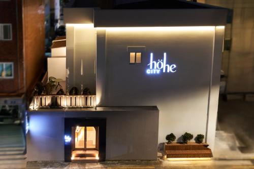 a model of a house with a fireplace at Hohe City Dongdaemun in Seoul