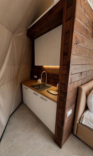 a bathroom with a sink in a tent at GSpace in Yaremche