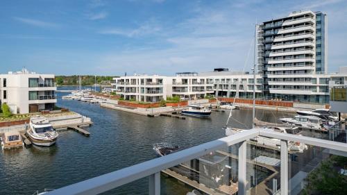 a view of a marina with boats in the water at Solmarina, Sun&Snow in Wiślinka