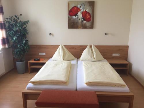 Cama o camas de una habitación en Gasthaus Hotel Feldschlange