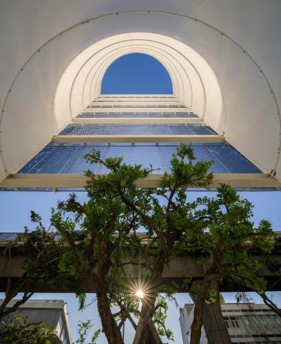 a view of the top of a building with a tree at BLU 395 Ari-Saphan Khwai in Bangkok
