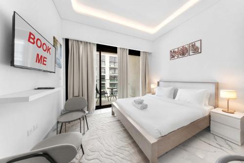 Free housekeeping visits during your stay - StayShort - Modern Studio in Meydan That Sleeps 2 with a Balcony