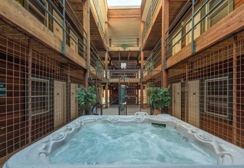 a hot tub in the middle of a building at Fall Line 107 in Telluride